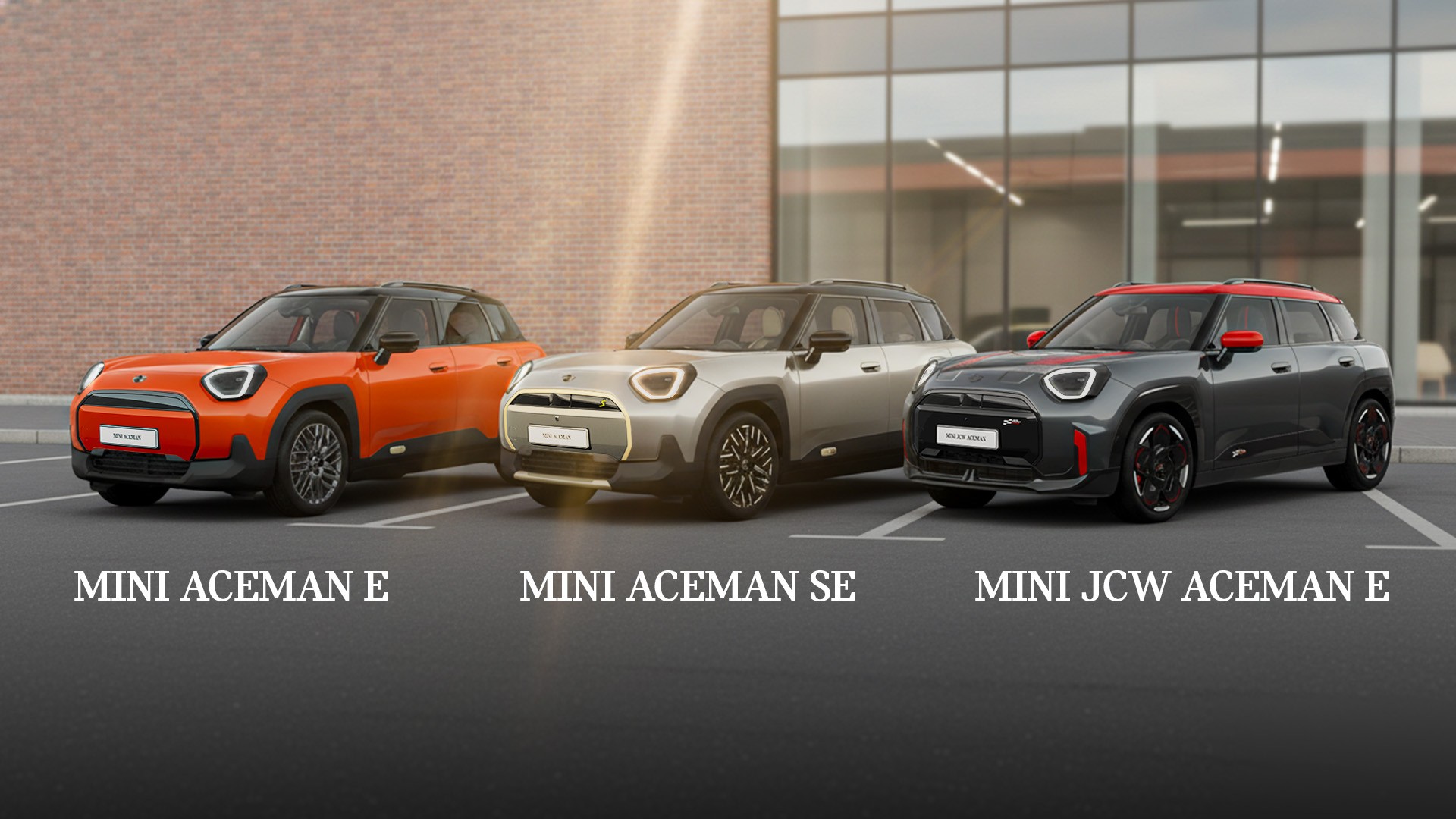 Gray MINI Aceman parked on a city street beside a bright purple and red building, featuring modern design and black roof.